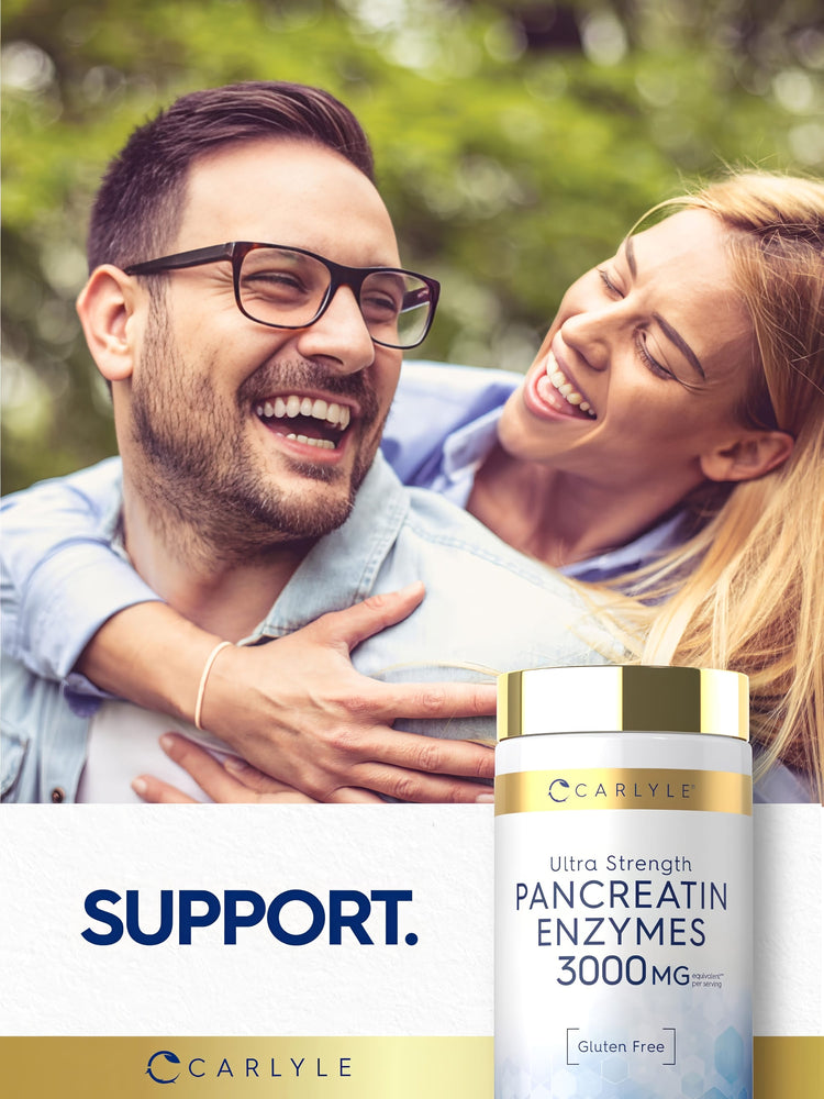 A young couple laughing and hugging, holding a bottle of Carlyle Pancreatin Enzymes, conveying joy and wellness.