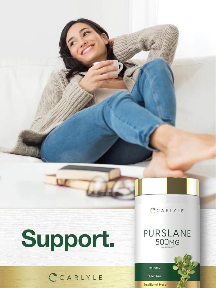 A young woman relaxes on a couch, holding a cup near a Carlyle Purslane 500 mg bottle, creating a serene lifestyle scene.