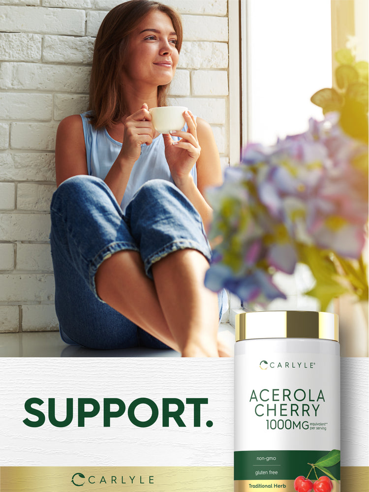 Lifestyle image of woman holding a cup by a window with Carlyle Acerola Cherry 1000MG bottle nearby and graphic stating SUPPORT.