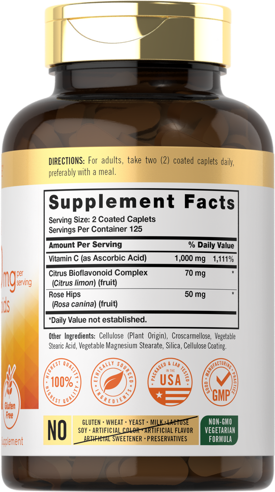 Carlyle Vitamin C 1000mg with Bioflavonoids, featuring 250 coated caplets, shown on a hand for scale.