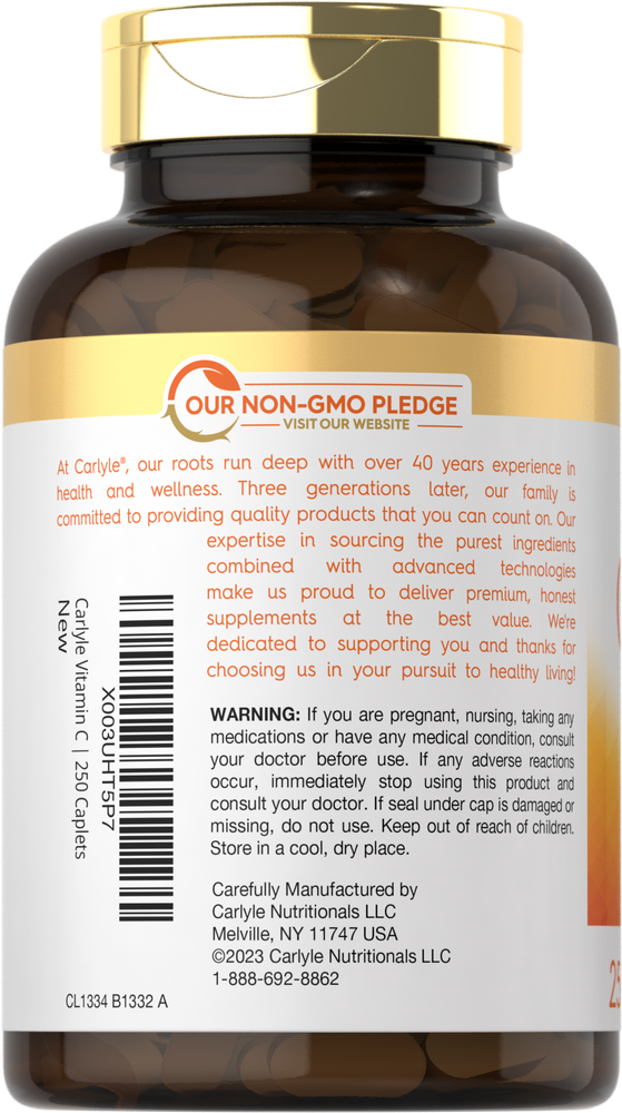 A bottle of Carlyle Vitamin C 1000mg with Bioflavonoids, containing 250 caplets, shown on a hand for size reference.