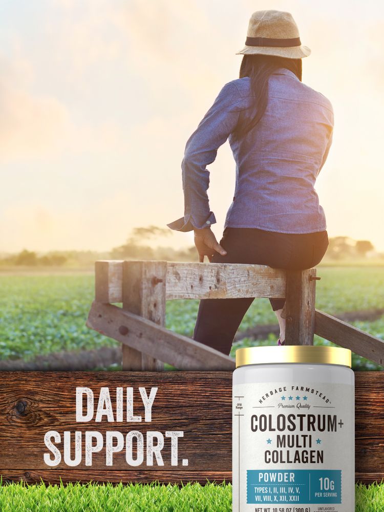 A woman in a straw hat and denim shirt sits on a wooden fence, looking at a sunny field, with a tub of Colostrum & Collagen Powder.