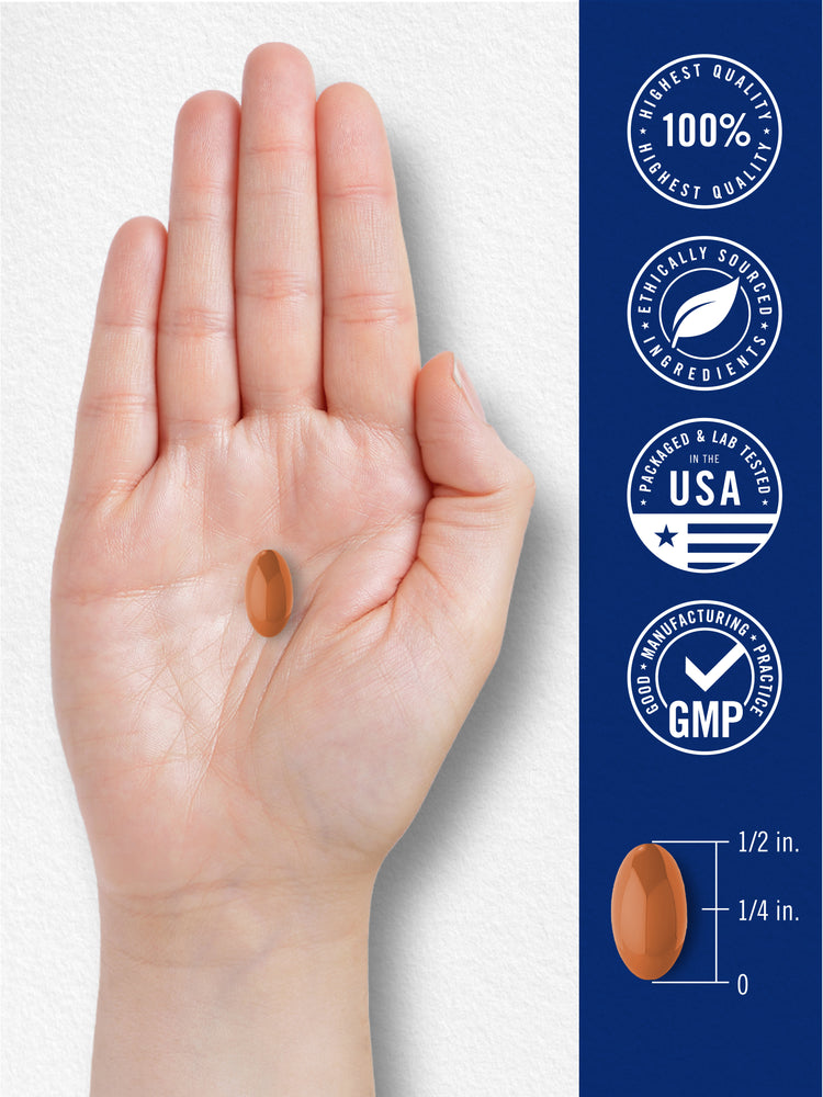 Orange Co Q-10 softgel, measuring 1/2 inch long and 1/4 inch wide, rests in a hand.