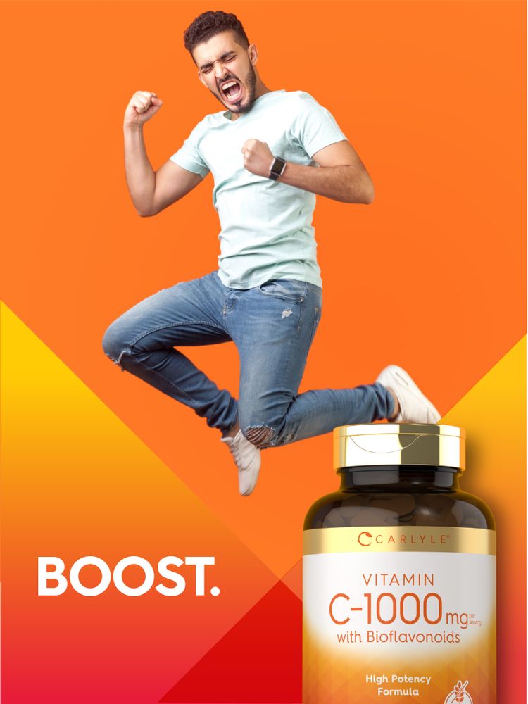 A young man jumps excitedly with fists clenched next to a Carlyle Vitamin C-1000mg with Bioflavonoids bottle.