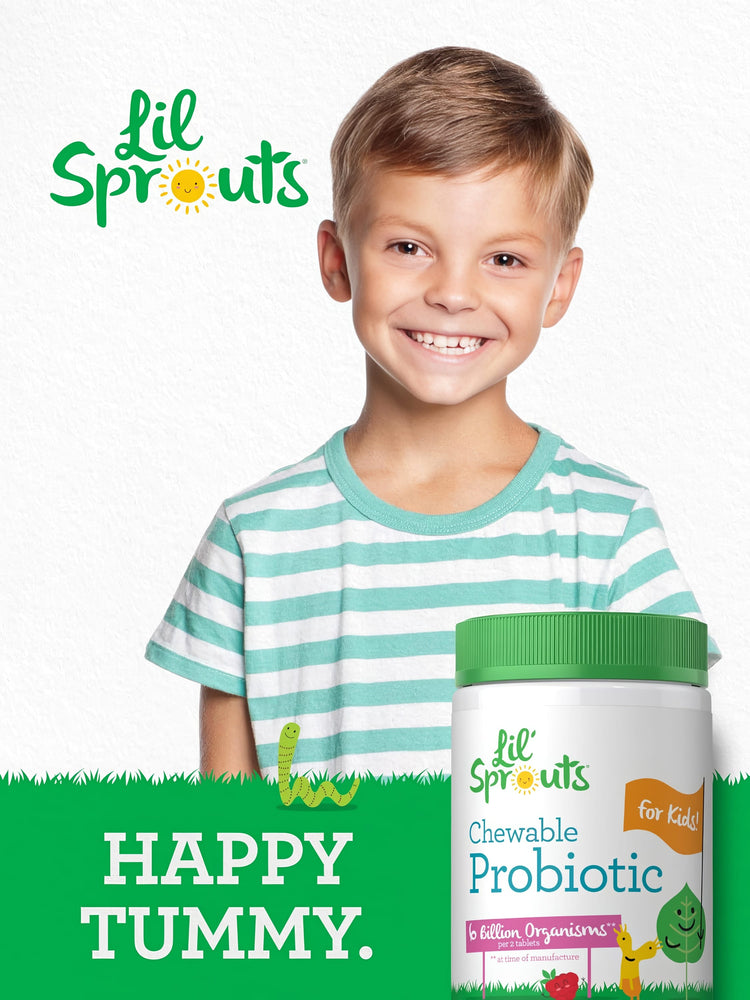 Young boy smiling while holding a bottle of Lil' Sprouts Chewable Probiotic.