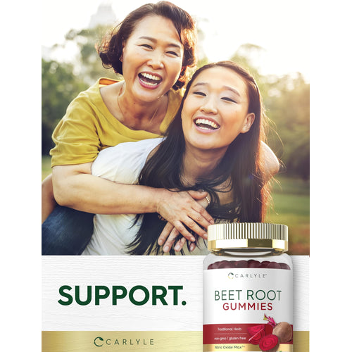 View 6 Two smiling Asian women enjoy a piggyback ride outdoors next to Beet Root Gummies, embracing joy and health together.