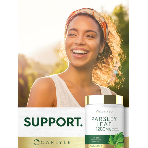 View 6 A young woman smiles outdoors next to a bottle of Carlyle Parsley Leaf.