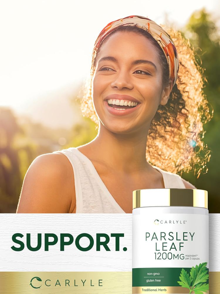 A young woman smiles outdoors next to a bottle of Carlyle Parsley Leaf.
