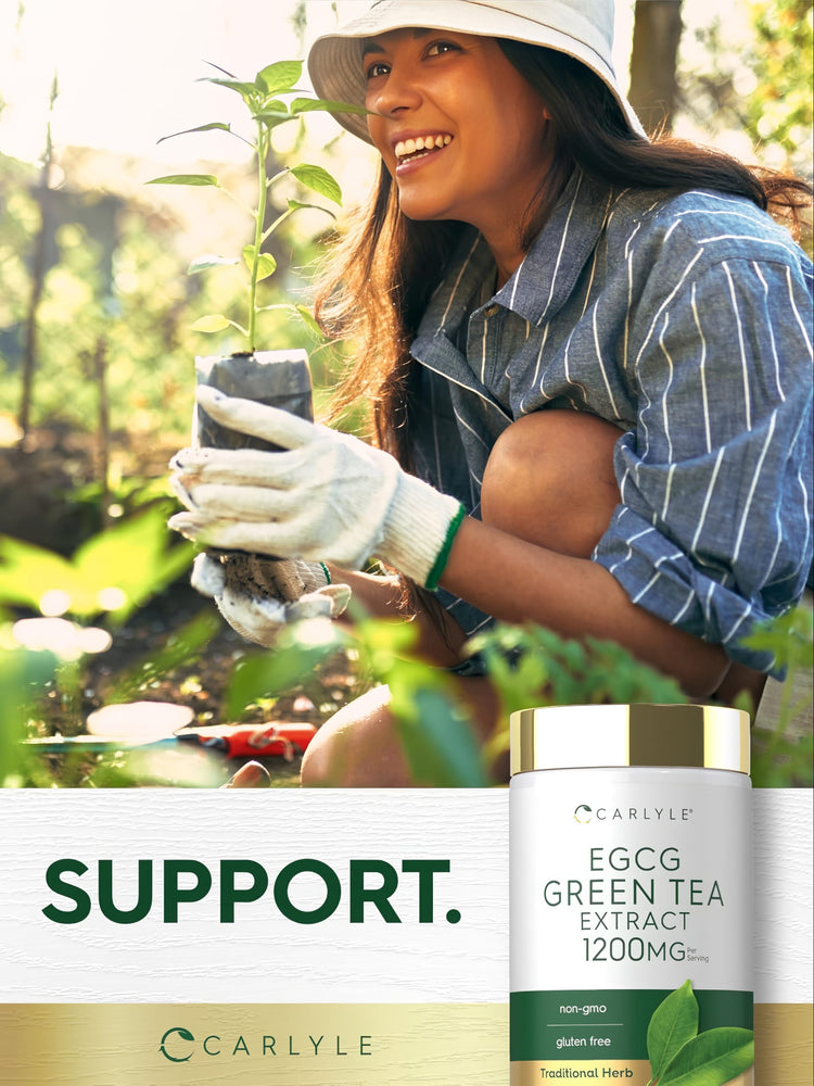 A young adult woman gardening and smiling with an EGCG Green Tea Extract bottle in hand.