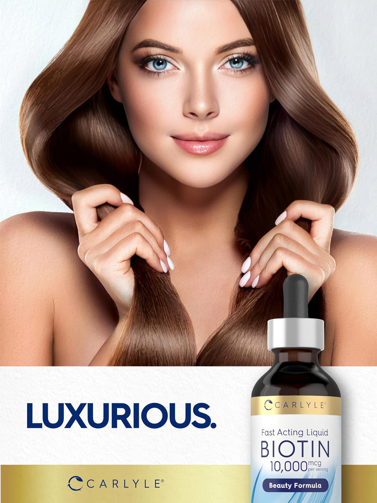 Young woman holds her long brown hair with a Carlyle Biotin bottle in her hand.