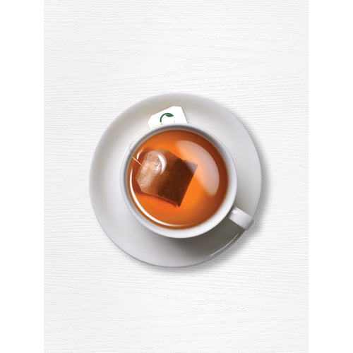 View 4 Cup of Blood Pressure Tea with tea bag steeping on a white saucer.