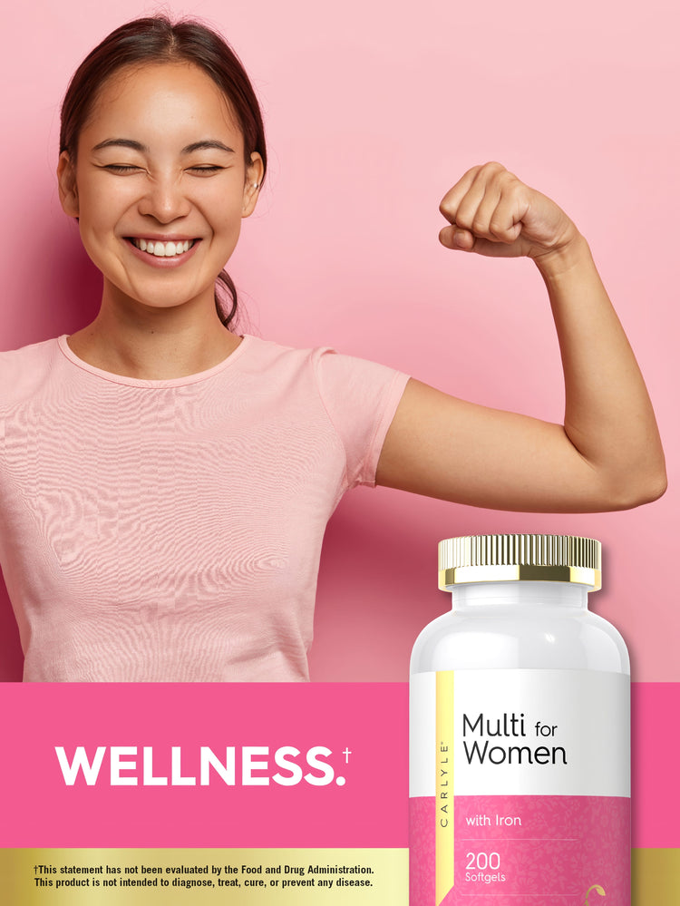 Lifestyle image of woman flexing her arm with Carlyle Multi for Women bottle and graphic stating WELLNESS
