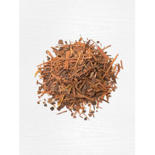 View 4 Pile of dried brown bark and wood shavings on a white background