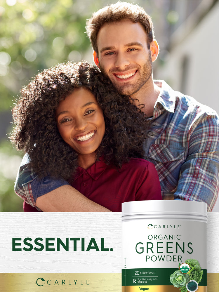 Lifestyle image of smiling adults embracing with Carlyle Organic Greens Powder bottle and graphic stating ESSENTIAL.