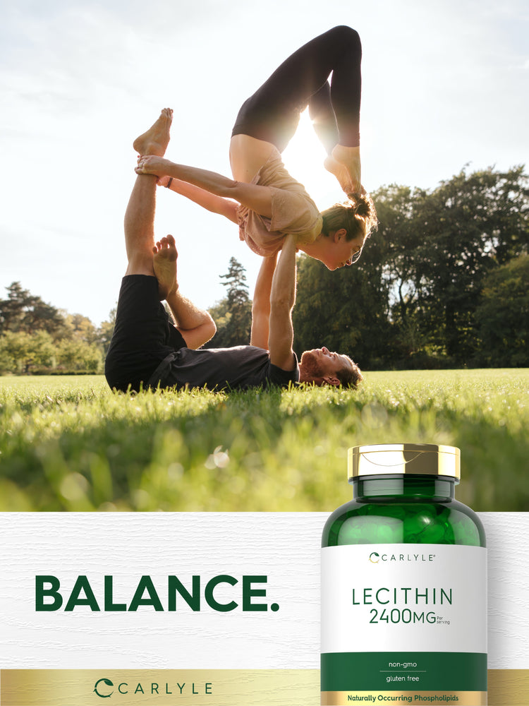 Lifestyle image of adults practicing partner yoga outdoors with Carlyle Lecithin 2400MG bottle and graphic stating BALANCE.