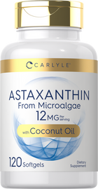 Carlyle Astaxanthin from Microalgae with Coconut Oil, 12 MG, 120 softgels shown in hand for scale.