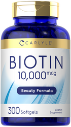 Bottle of Biotin 10,000 mcg softgels, 300 count, shown on a hand scale for size reference.