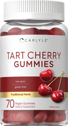 A hand holding a bottle of Carlyle Tart Cherry 70 Vegan Gummies, showcasing its quantity and vegan-friendly nature.