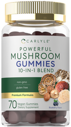 Carlyle Powerful Mushroom gummies, vegan and available in a 70-count bottle, shown in a hand for scale.
