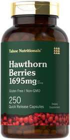 A hand holding a scale with a bottle of 250 Hawthorn Berries 1695mg Quick Release Capsules.