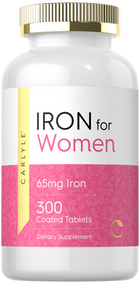 A hand holds a scale with a bottle of 65mg Iron 300 coated tablets, emphasizing the product's bulk quantity.