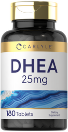 Bottle of Carlyle DHEA 25mg containing 180 tablets placed on a small hand scale.