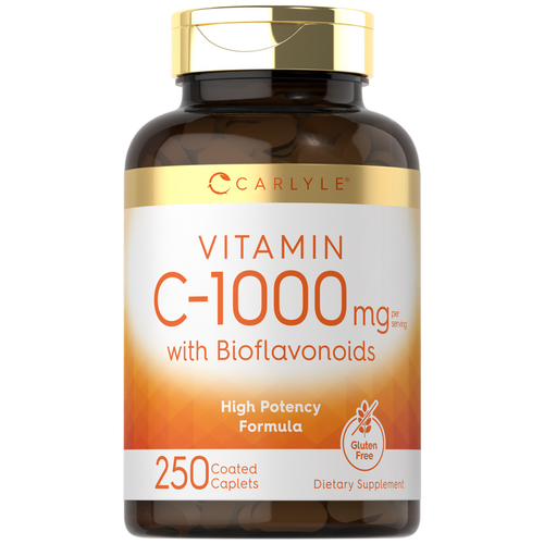 View 1 Hand holding Carlyle Vitamin C 1000 mg with Bioflavonoids, 250 Coated Caplets, showcasing the product size and packaging.