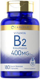 Carlyle Vitamin B-2 (Riboflavin) 400 mg features 180 quick release capsules, shown on a hand scale.