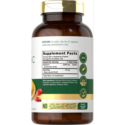 View 2 Carlyle Vitamin C 1000 mg vegetarian caplets on a hand scale showing their bulk size and quantity.