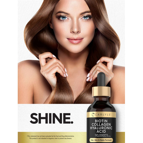 View 6 A young woman with long, shiny brown hair touches her hair near a Carlyle Biotin Collagen Hyaluronic Acid 110,000 mcg liquid bottle.