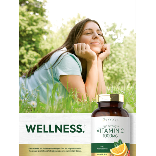 View 6 Carlyle Vitamin C 1000 mg tablets with Wild Rose Hips in a 300 count bottle, shown on a hand for size reference.