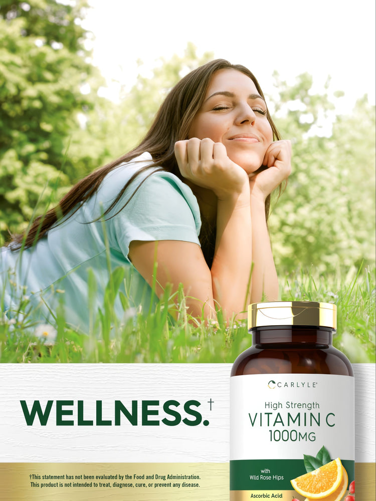 Carlyle Vitamin C 1000 mg tablets with Wild Rose Hips in a 300 count bottle, shown on a hand for size reference.